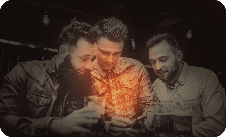 gloworder-image-of-three-men-looking-at-phone-displaying-gloworder-with-desaturated-subjects